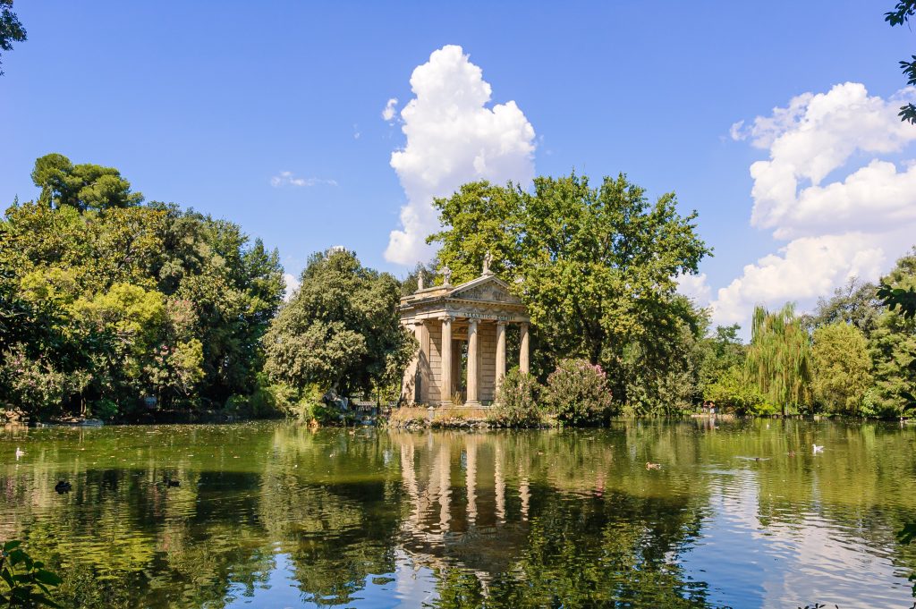 A temple overlooking a lake.