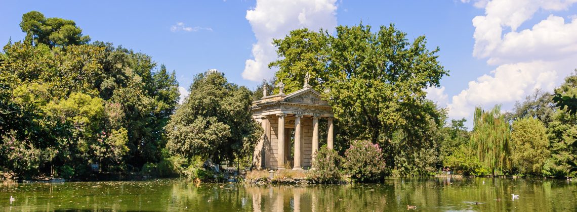 A temple overlooking a lake.