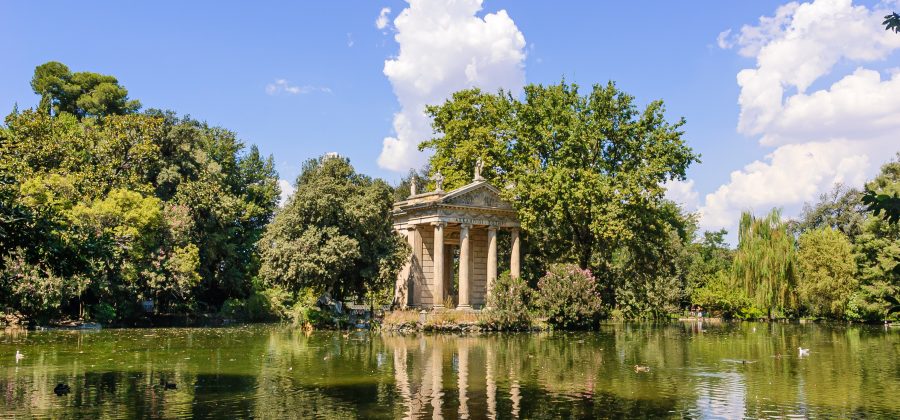 A temple overlooking a lake.