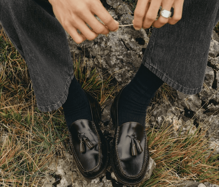 A pair of black leather shoes