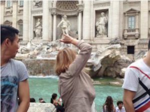 Throwing Coins in the Trevi Fountain