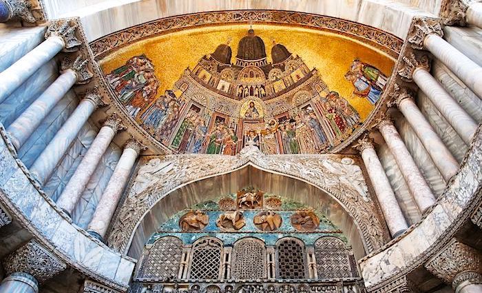 Facade of St. Mark's Basilica in Venice with beautiful decorations