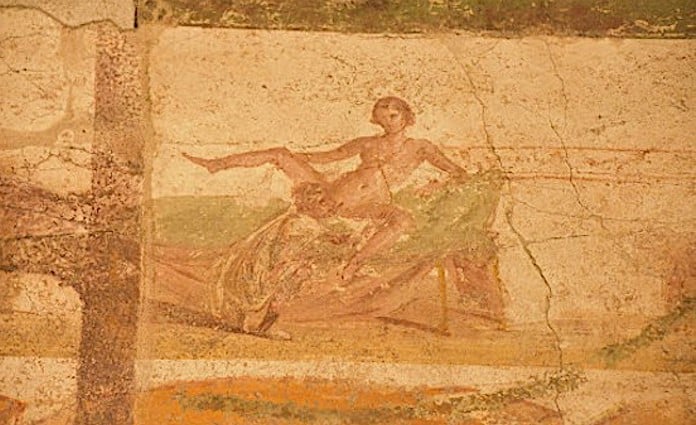 Painted walls of the Pompeii brothel.