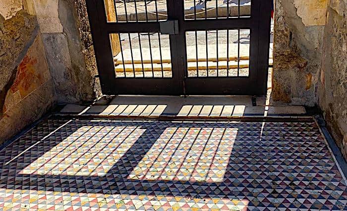 mosaic floor of the house of vettii in the Pompeii Archaeological  Park