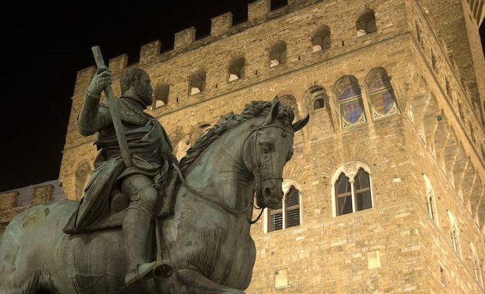Cosimo de'Medici Statue with Palazzo Vecchio behind it. Florence, Italy