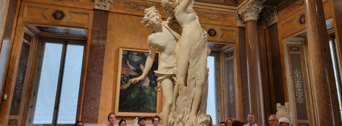 people looking at apollo and daphne sculpture at borghese