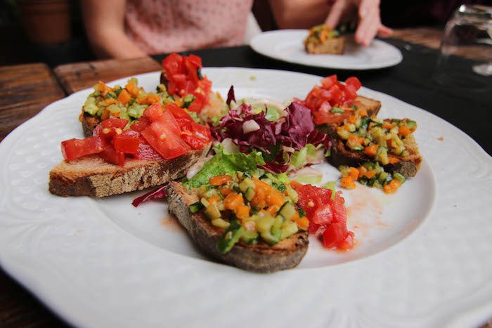 Aperitivo in Italy involves light food dishes