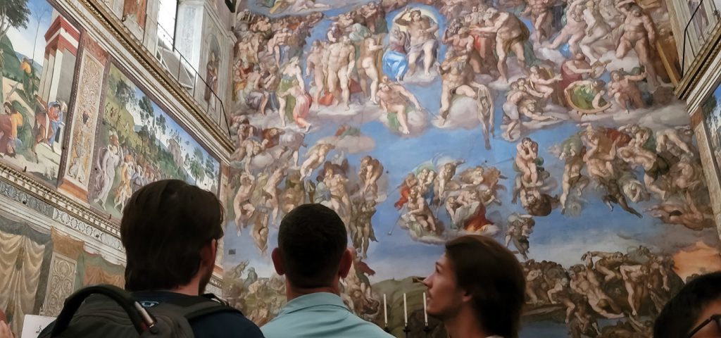 people looking at the sistine chapel