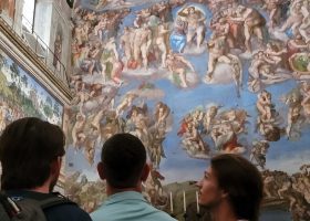people looking at the sistine chapel