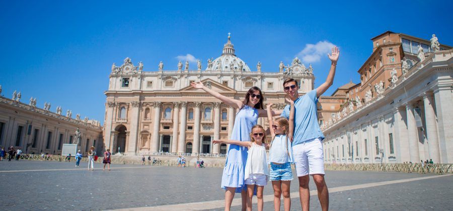 st peter's square with basilica with happy family
